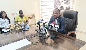 Bright Appiah (right), Executive Director, Child Rights International, Ghana, addressing journalists at the news conference