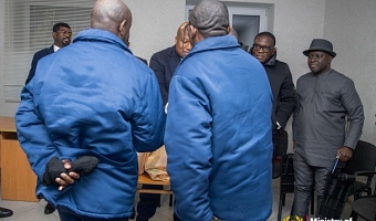 The two Ghanaian prisoners of war shaking hands with Samuel Okudzeto Ablakwa, the Minister of Foreign Affairs.