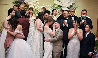 Same-sex couples at a mass wedding ceremony in Hong Kong last year. The ceremony was performed by a pastor online from the United States, as same-sex partnerships are not recognized in Hong Kong.Credit...Peter Parks/Agence France-Presse — Getty Images