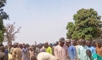 People dig graves with shovels after a deadly attack by an armed gang in Katsina, Nigeria, February 4, 2026, in this screengrab from video. Reuters TV/via REUTERS