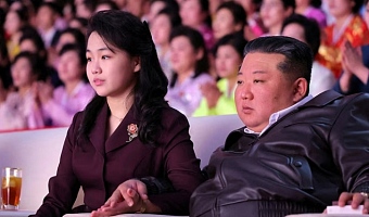 North Korean leader Kim Jong Un and his daughter Kim Ju Ae attend a performance commemorating International Women's Day in Pyongyang, North Korea. KCNA via REUTERS