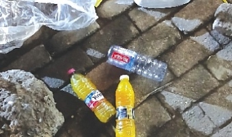 It is common to find urine in plastic water bottles on pavements at night
