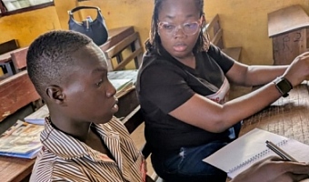 Our reporter, Efia Akese interacting with Kennedy Mensah Dogbe, a beneficiary of the ‘Camp Dream.Speak.Live’