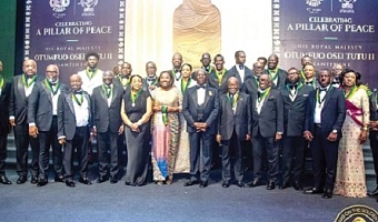 Otumfuo Osei Tutu II (7th from right), the Asantehene, flanked by Nana Addo Dankwa Akufo-Addo (6th from right) and Nana Oye Pampoe Addo, Deputy Chief of Staff, with some dignitaries and honourees after the event