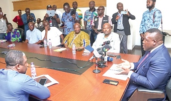 Samuel Nartey George (right), Minister of Communications, Digitalization, and Innovations, addressing the meeting. Picture: ELVIS NII NOI DOWUONA