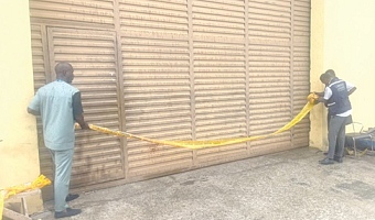 The enforcement team sealing Nyankonton Building Materials company at Oyarifa