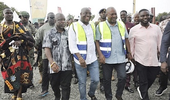 President John Dramani Mahama (2nd from right) and Eric Kutortse (2nd from left), Chief Executive Officer, First Sky Limited, the contractors, arriving at the venue for the sod-cutting