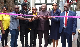 Dr James Orleans-Lindsay (3rd from right), President, Ghana Real Estate Developers Association, being assisted by Samuel Essel (right), Director, Finance, GCGL; Gloria Frempong (middle), Senior Manager, Data, Device and Home, MTN; COP Dr Sayibu Gariba (3rd from left) and some dignitaries to cut the tape to open the Graphic-GREDA Home Fair 2025. Picture: ELVIS NII NOI DOWUONA