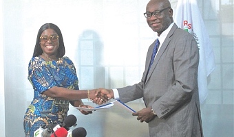 Obuobia Darko- Opoku (left), Administrator of the Ghana Medical Trust Fund, and Prof. Richard M. K. Adanu, Rector of the Ghana College of Physicians and Surgeons, exchanging the signed documents. Picture: ESTHER ADJORKOR ADJEI 