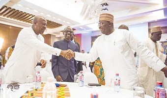 Dr Mahamudu Bawumia (right), shaking hands with John Mahama after the 2024 Presidential Election