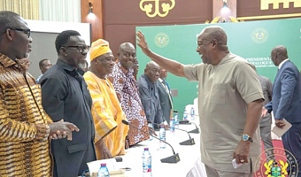President John Dramani Mahama (right) exchanging pleasantries with the leadership of Organised Labour during the dialogue