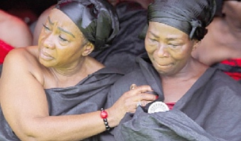 Akosua Serwa (right), wife of Daddy Lumba, being consoled. Picture: CALEB VANDERPUYE