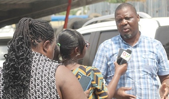 Kweku Bernard (right), Chairman of the East Legon Hills Water Utility Committee, addressing the media after the meeting. Picture: ESTHER ADJORKOR ADJEI  