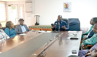 Emmanuel Kwame Alorvi (middle), Board Chairman of NTC, addressing the press conference, with Dr Christian Addai-Poku (3rd from left), Registrar of NTC, and other management staff of NTC in attendance