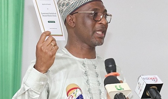Muntaka Mohammed-Mubarak, Minister for the Interior, launching the document to guide religious tolerance in government-assisted and private mission schools in Accra