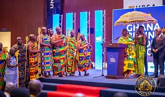 Otumfuo Osei Tutu II (seated), Asantehene, exchanging pleasantries with Prof. Joshua Alabi (left), Board Chair, GCB Bank PLC. Looking on are Prof. John K. M. Mawutor (3rd from right), Vice-Chancellor, UPSA, and other officials of the university. Picture: ERNEST KODZI