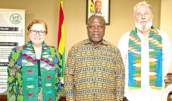 James Gunu, Volta Regional Minister, flanked by Laura Ranalli, the Italian Ambassador, and her husband, Piotr Kepinski