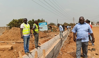  Ernest Norgbey (left), MP for Ashaiman, inspecting ongoing construction works in some suburbs of Ashaiman.
