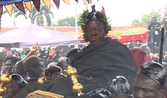 Asantehene, Otumfuo Osei Tutu II (in a palanquin) on his arrival at the funeral grounds at Manhyia Palace in Kumasi. Pictures: EMMANUEL BAAH