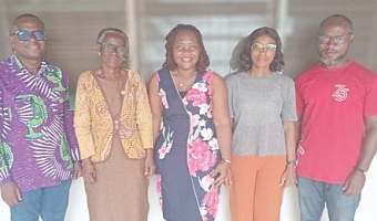 Prof. Akua Opokua Britwum (2nd from left), Chairperson, National Media Commission; Rev. Isaac Owusu  (left), member of NMC, with the staff of Cape Coast office of the Graphic Communications Group Ltd