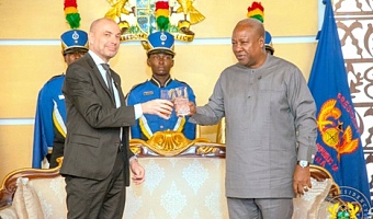 President Mahama proposing a toast with Jakob Linulf, Ambassador of Denmark