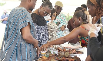 Emelia Arthur, Minister of Fisheries and Aquaculture, interacting with exhibitors during her inspection