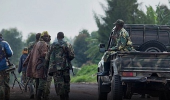 Rebels armed with machetes kill at least 52 in eastern Congo