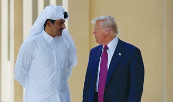 US PRESIDENT Donald Trump talks with Qatari Emir Tamim bin Hamad Al Thani in Doha in May. (photo credit: BRIAN SNYDER/REUTERS)