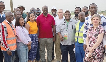 Dr Cassiel Ato Forson (middle), Minister of Finance, with officials of the World Bank and the West Africa Food Security Resilience Programme after the tour