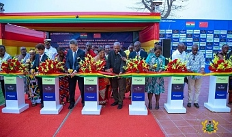 President Mahama (middle), Mr Shen Yanchang (third from left), Mrs Elizabeth Ofosu-Adjare (third from right) and others jointly cutting the tape for construction of the glass factory