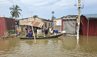 Residents of Tetegu have resorted to the use of canoe within the community. Picture: DOUGLAS ANANE-FRIMPONG