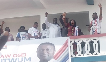 Dr Yaw Osei Adutwum (arrowed) acknowledging cheers from his supporters 
