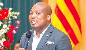 Samuel Okudzeto Ablakwa (right), Minister of Foreign Affairs, addressing the Ghanaian Community during a townhall meeting in Vic, Spain 