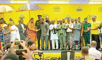 Dr Frank Amoakohene (5th from left), Ashanti Regional Minister, exchanging pleasantries with Nana Debrah Boateng Bediako (4th from left), Kwamanghene, after officially launching the festival, while other dignitaries look on