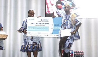 Baba Hamidu (right), the winner of the Wear UG Day Fashion show receiving his prize from Prof. Nana Aba Appiah-Amfo (left), the Vice Chancellor of the University of Ghana. 