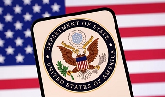 United States Department of State logo and U.S. flag are seen in this illustration taken April 23, 2025. REUTERS/Dado Ruvic/Illustration