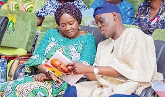 Haruna Iddrisu (right), Minister of Education, conferring with Vice-President Prof. Naana Jane Opoku-Agyemang at the Ghana Teacher Prize Awards