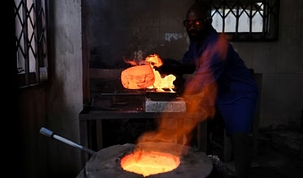 A worker smelts gold at a facility in Accra, Ghana August 22, 2024. REUTERS/Francis Kokoroko