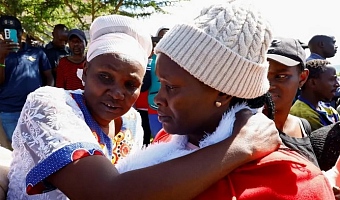 Worried parents and relatives gathered outside the school in Gilgil for news of their children