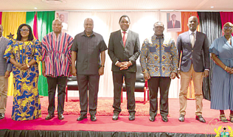 President John Dramani Mahama (4th from left) and Hakainde Hichilema (4th from right), President of Zambia, with some government officials who accompanied President Mahama.