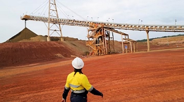 A mine worker walks near a conveyor belt as commercial gold production begins at the Newmont Ghana Gold Limited, Ahafo North Mine, in Afrisipakrom community in the Ahafo Region, Ghana. October 29, 2025. REUTERS/Francis Kokoroko/File Photo