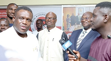 Samuel Nartey George (left), Minister of Communication, Digital Technology and Innovations, seeking clarification during the visit to the monitoring room. With him are Cosmas Anpengnuo (2nd from right), acting Executive Secretary, Postal & Courier Services Regulatory Commission, and Bishop Francis Afotey Odai (2nd from left), Chairman, PCSRC