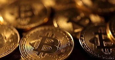 Crypto markets steady as Bitcoin holds near $70,000