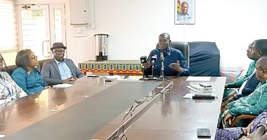 Emmanuel Kwame Alorvi (middle), Board Chairman of NTC, addressing the press conference, with Dr Christian Addai-Poku (3rd from left), Registrar of NTC, and other management staff of NTC in attendance