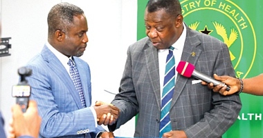 Prof. Agyeman Badu Akosa (right), a former Director- General, Ghana Health Service, and Chairman, Investigation Committee, presenting the report to Kwabena Mintah Akandoh, Minister of Health. Picture: ELVIS NII NOI DOWUONA 