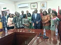 Haruna Iddrisu (arrowed), Minister of Education, assisted by Dr Clement Apaak (behind), Deputy Minister of Education, with some heads of Special Schools and some members of the disability community