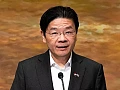 Lawrence Wong said the pay raise was necessary to attract talent