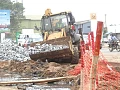 The contractor stabilising the excavated road section with boulders to prepare for the next phase of construction. Picture: ESTHER ADJORKOR ADJEI 