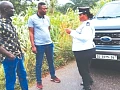 Chief Superintendent Benedicta Akpene Ansah, Volta Regional MTTD Commander explaining a point to two occupants of vehicles intercepted during the exercise