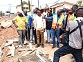 Dr Ernest Henry Norgbey, MP for Ashaiman; Freeman Tsekpo, MCE for Ashaiman, and other stakeholders inspecting ongoing road and drainage projects in the municipality